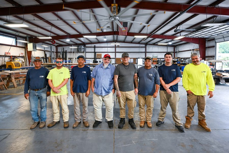 The Brinn Glass fabrication team in the New Bern shop